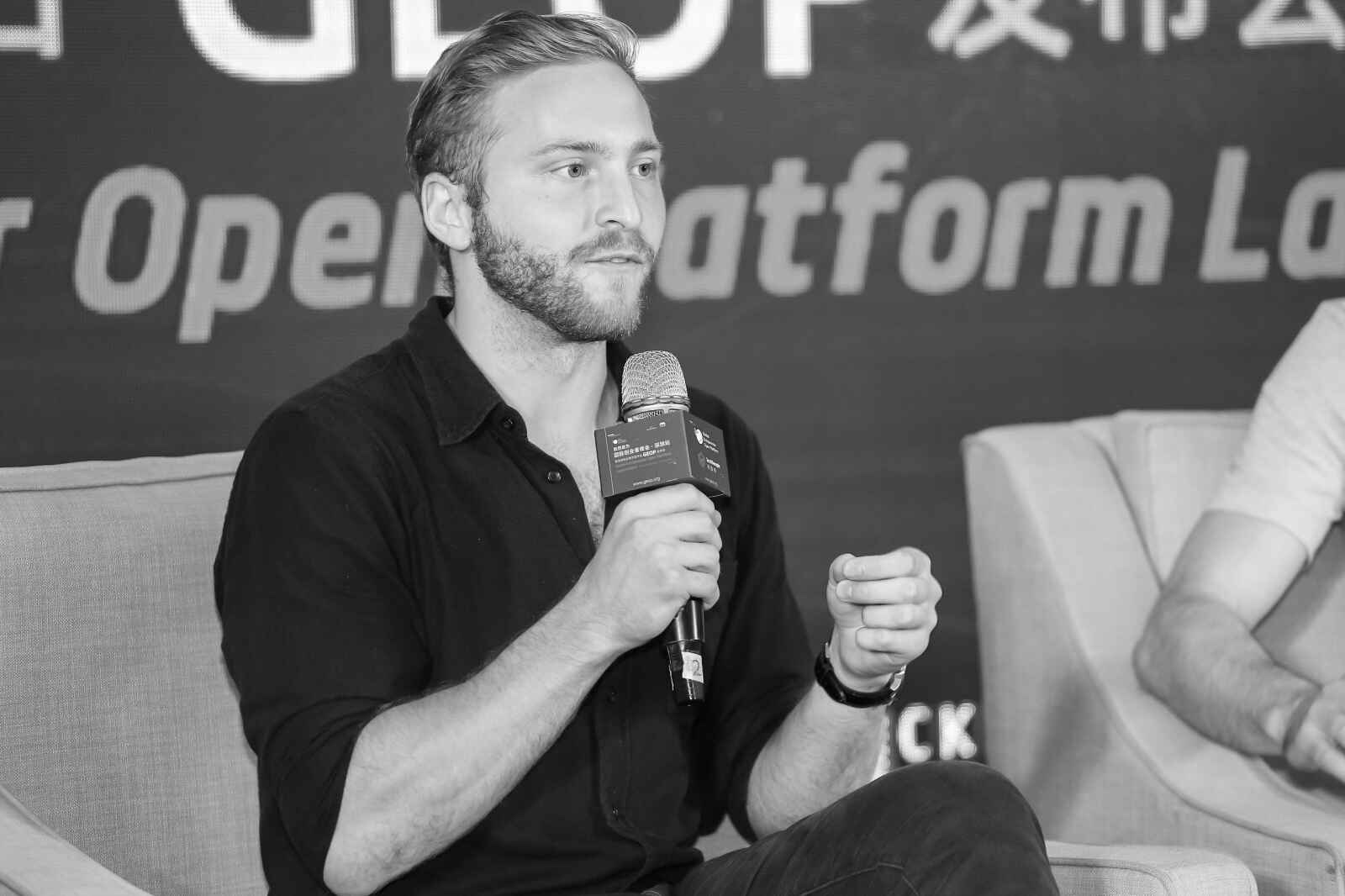 Brian speaking at a conference in China